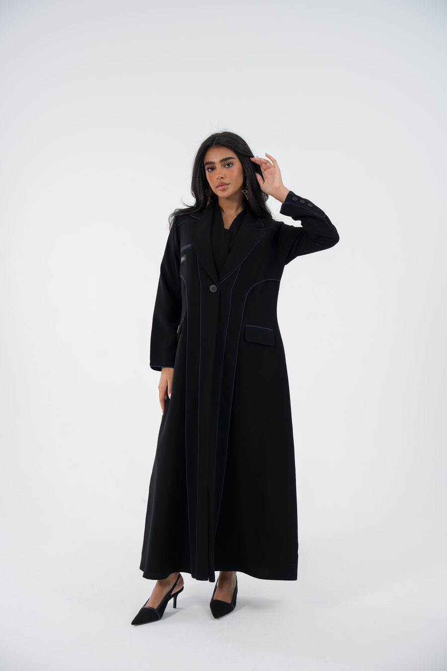 Woman wearing black Midnight Blazer Crepe Abaya with structured silhouette and long sleeves
