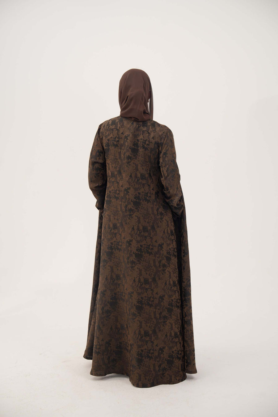 Back view of a lightweight espresso brown jacquard silk abaya with subtle textured weave and full-length sleeves.