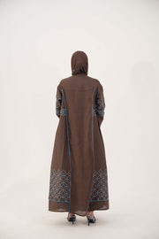 Mocha brown linen-blend abaya with sky-blue embroidery and batwing cut, open front, and blue piping details