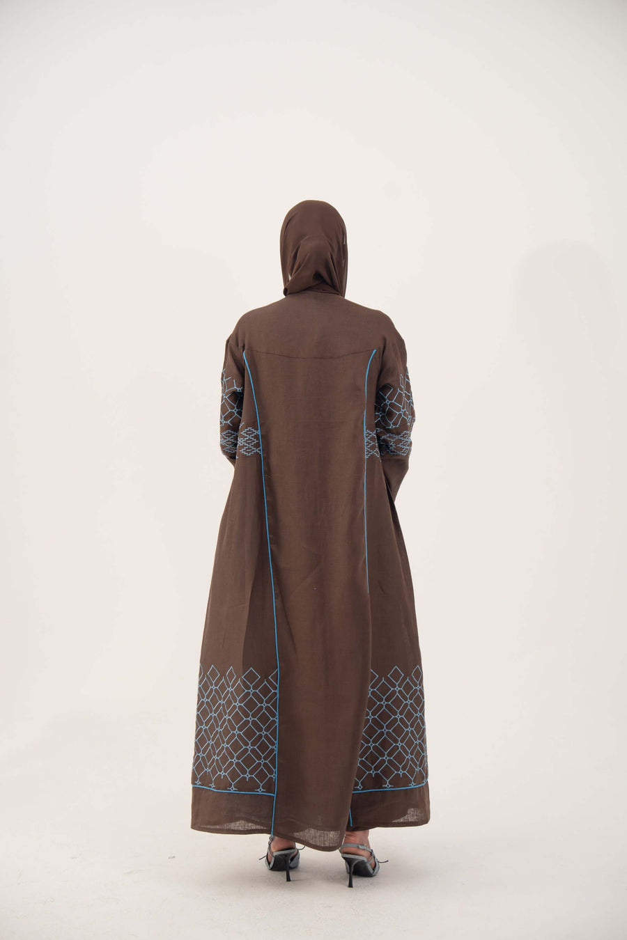 Mocha brown linen-blend abaya with sky-blue embroidery and batwing cut, open front, and blue piping details