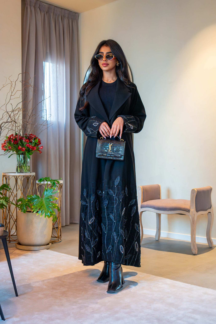 Elegant black crepe abaya with delicate leaf embroidery on cuffs and hem, featuring a lightweight fabric for comfortable all-day wear - Night Leaf