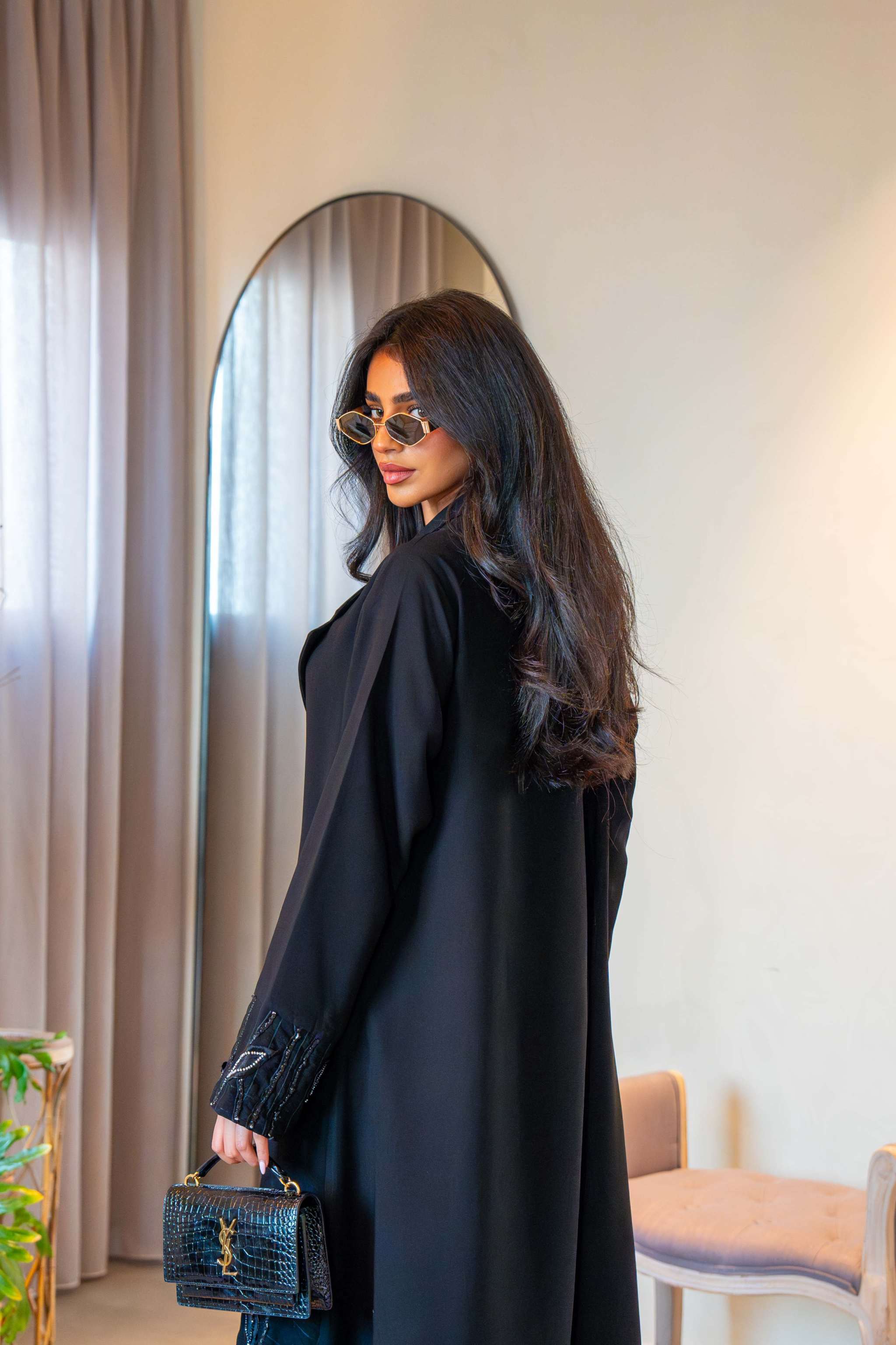 Elegant black crepe abaya with delicate leaf embroidery on cuffs and hem, featuring a lightweight fabric for comfortable all-day wear - Night Leaf