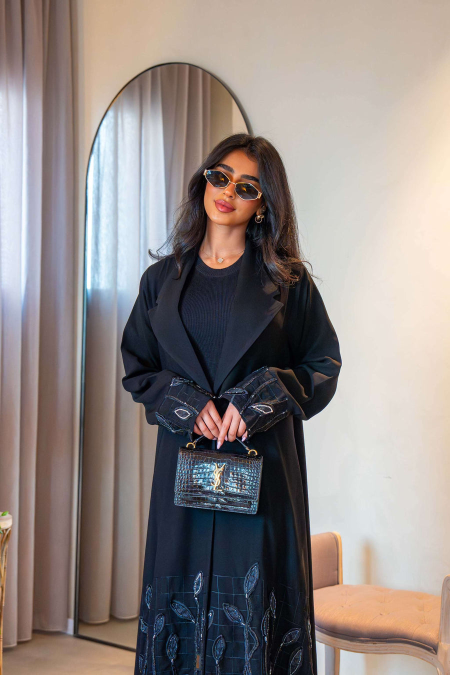 Elegant black crepe abaya with delicate leaf embroidery on cuffs and hem, featuring a lightweight fabric for comfortable all-day wear - Night Leaf