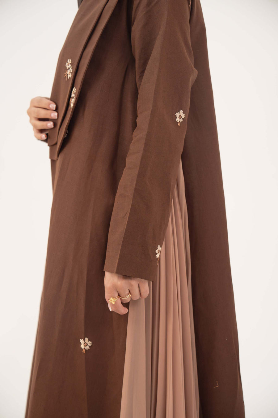 Brown linen blazer abaya with delicate embroidery and pleated chiffon side panels for elegant daytime wear