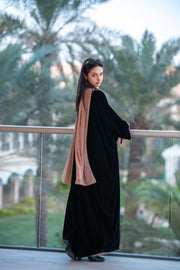 Ayla elegant black velvet abaya with intricate embellishments and flowing silhouette for formal or sophisticated everyday wear