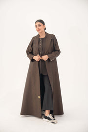 brown jacquard blazer abaya with sharp lapels, structured tailoring, faux pockets, and double buttons for a formal, elegant look