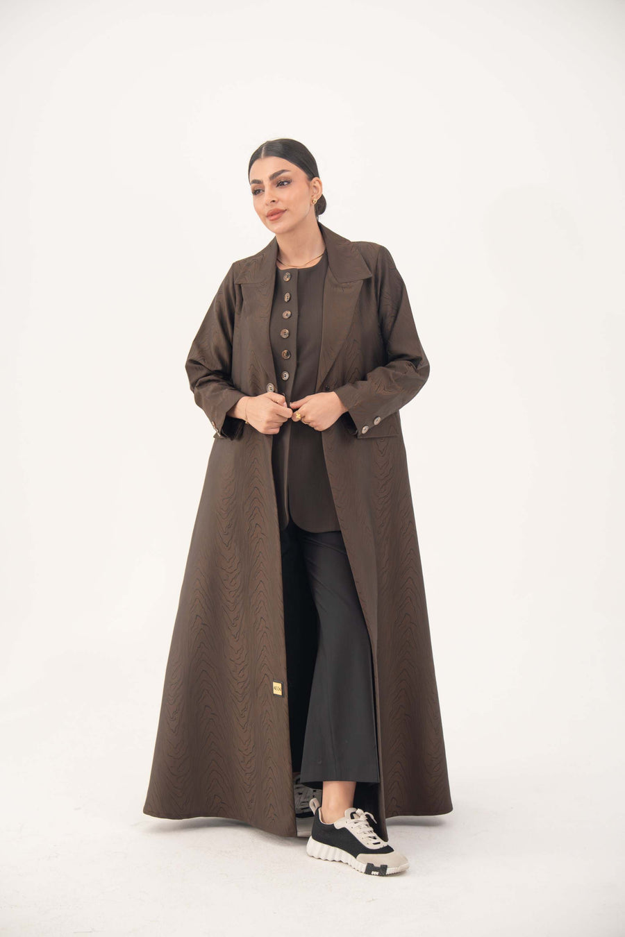 brown jacquard blazer abaya with sharp lapels, structured tailoring, faux pockets, and double buttons for a formal, elegant look