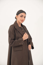 Brown jacquard blazer abaya with sharp lapels, structured tailoring, faux pockets, and button details for formal and professional wear.