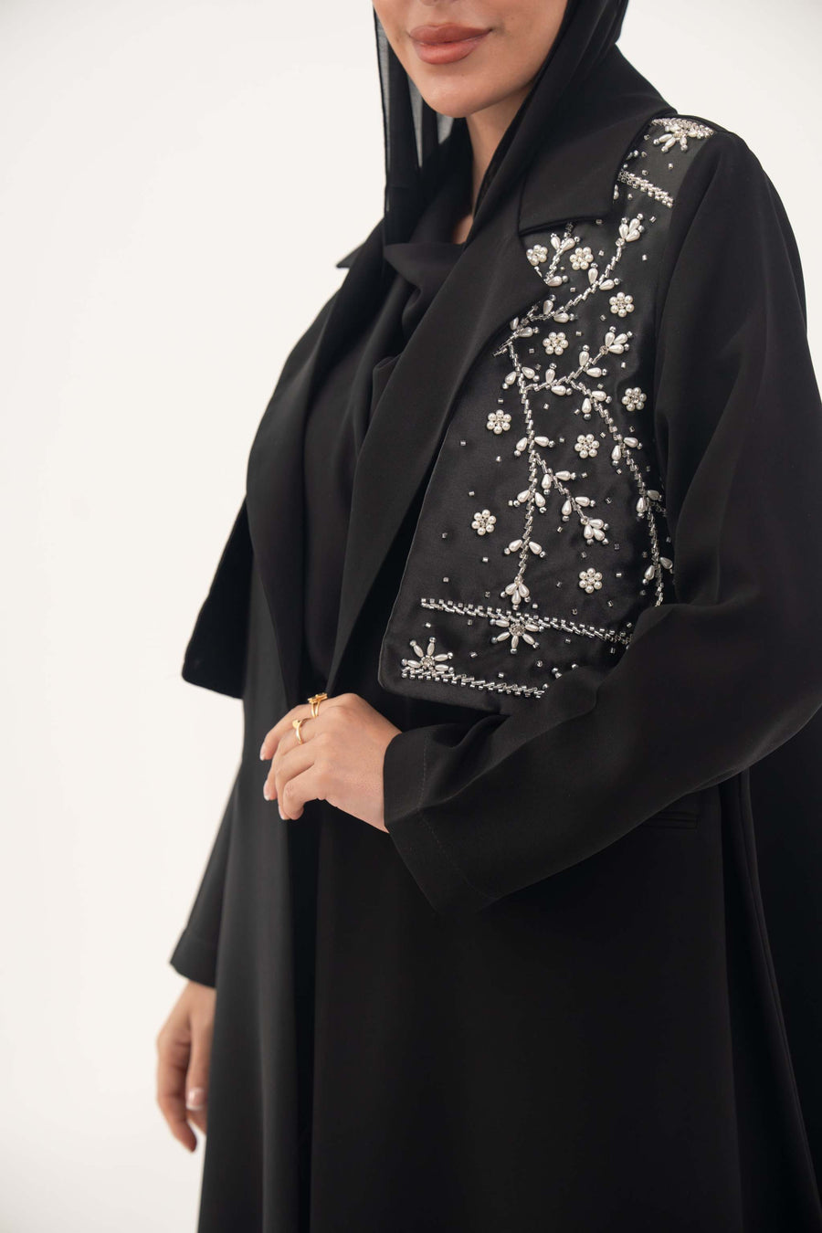 Black Layal blazer abaya with satin vest layer and crepe fabric, featuring a notched collar and structured shoulders