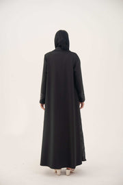 Back view of black jacquard blazer abaya with structured silhouette and classic lapels, perfect for formal occasions.