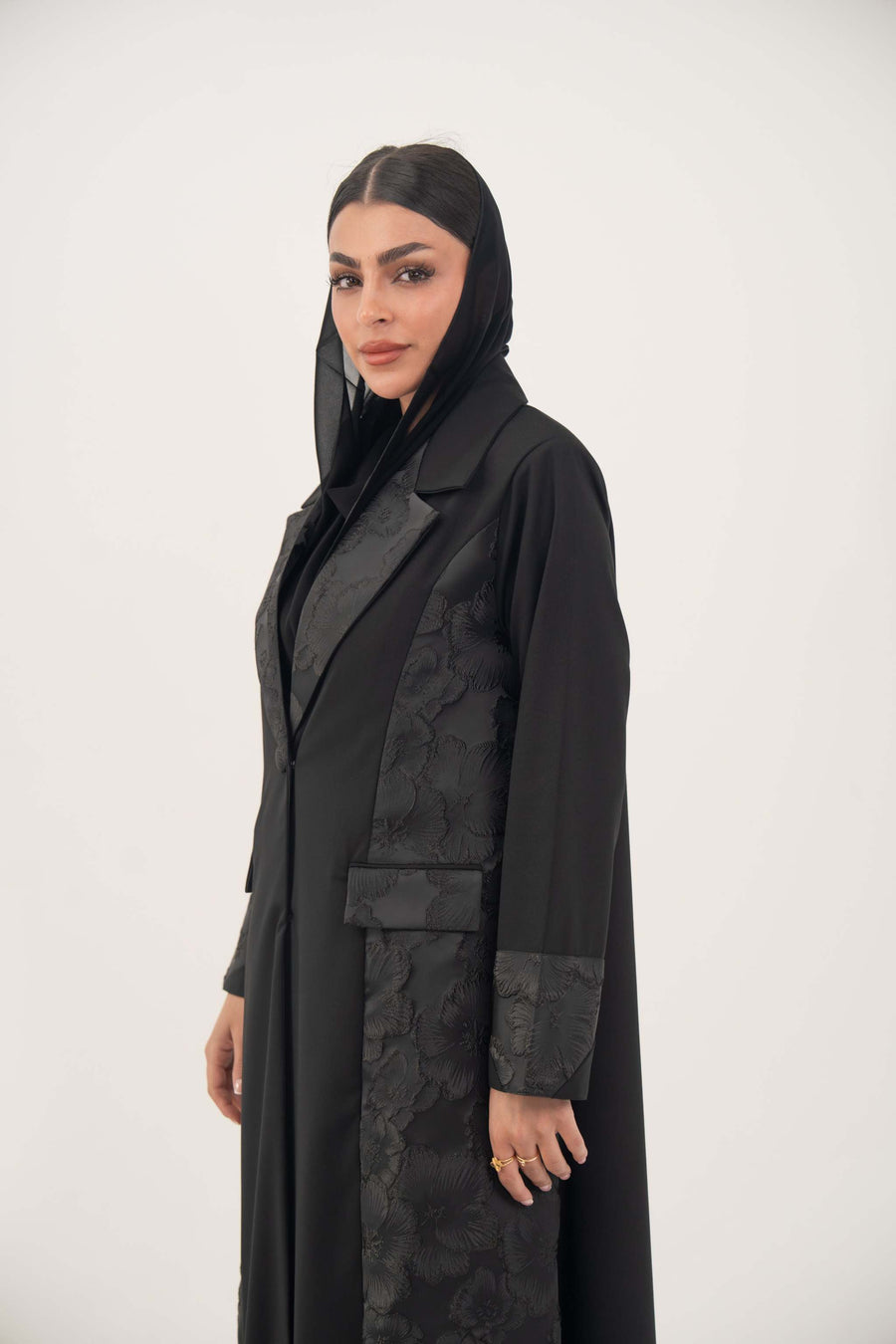 Black jacquard blazer abaya with structured silhouette and classic lapels for formal wear
