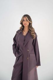 Elegant tailored blazer abaya in soft neutral twill linen blend with structured lapels and statement buttons