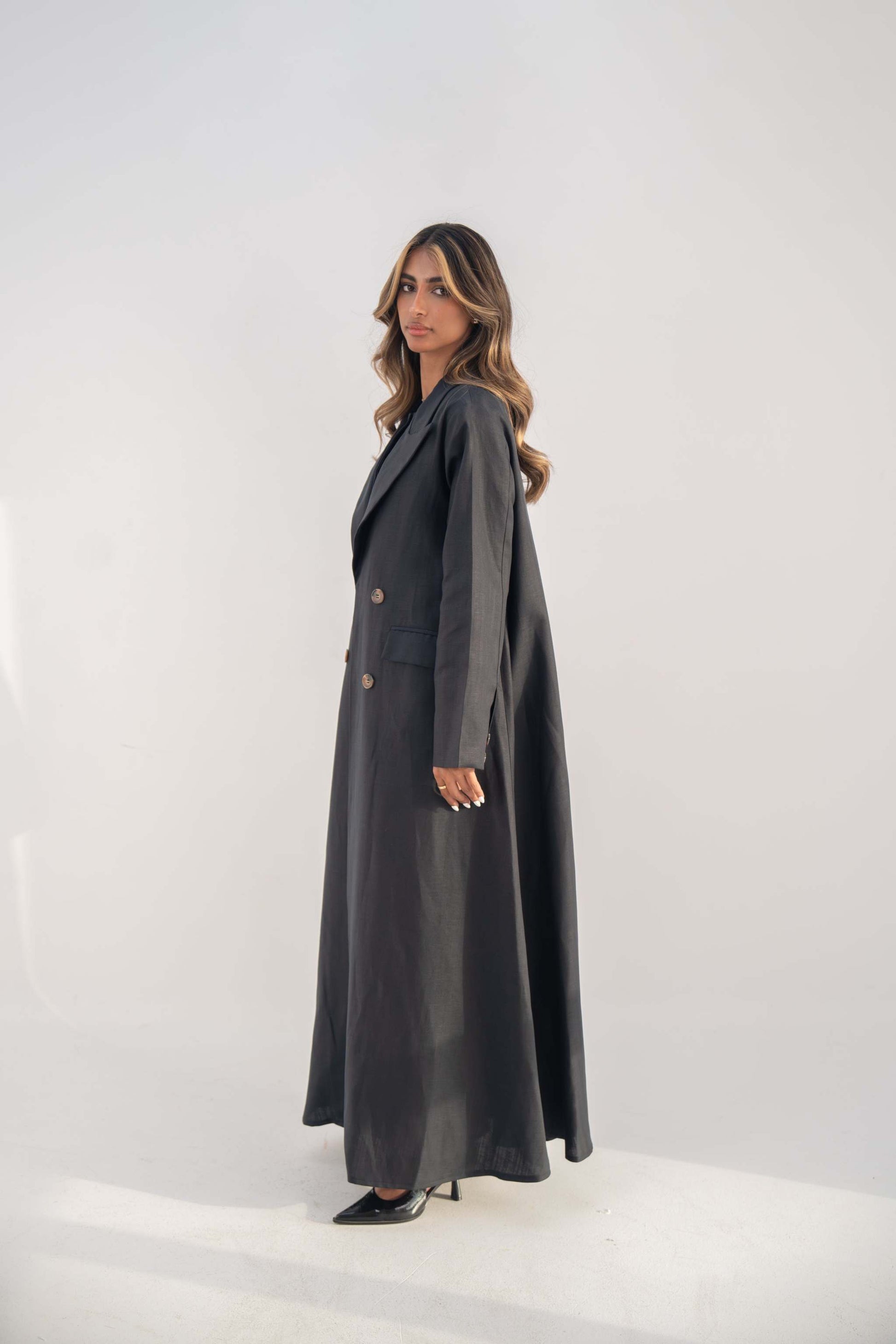 navy blue blazer abaya with double-breasted buttons and sharp lapel collar for a sleek silhouette