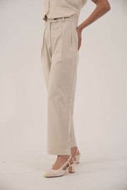 Beige linen wide-leg pants with side pockets for casual warm-weather wear