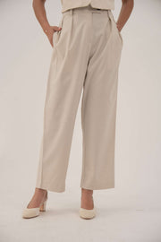 Beige linen wide-leg pants with side pockets for casual summer wear