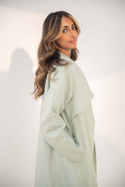 abaya crafted from soft twill linen blend in mint green with open-front design and draped collar