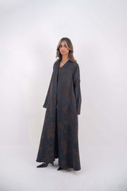 Elegant deep navy jacquard silk abaya with subtle brown floral patterns and wide sleeves