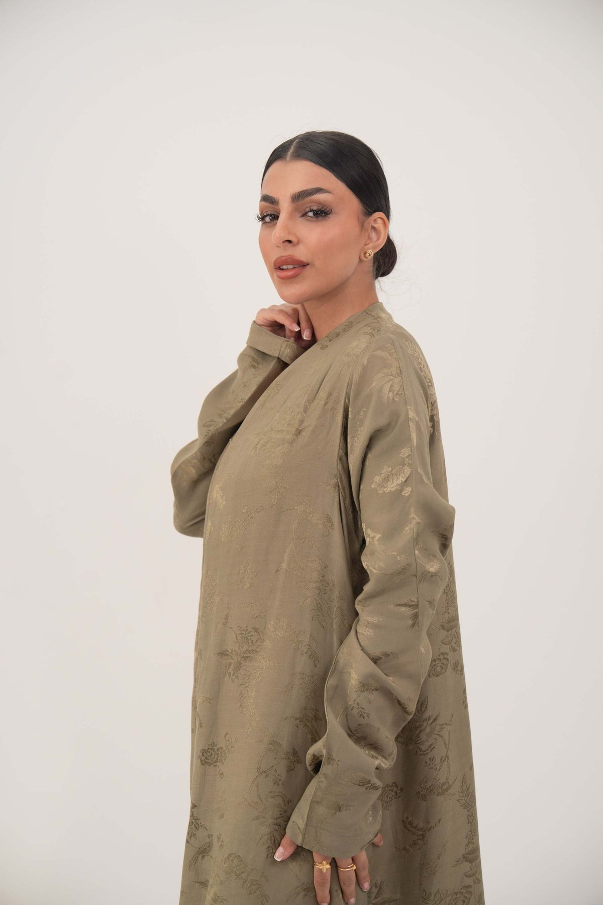 Elegant soft olive green silk abaya with collarless open-front and ruched full-length sleeves