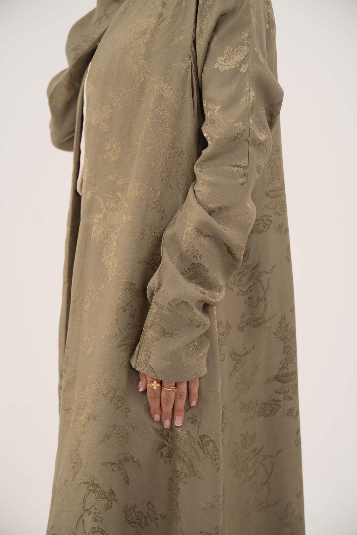Olive green silk abaya with collarless open front and ruched full-length sleeves