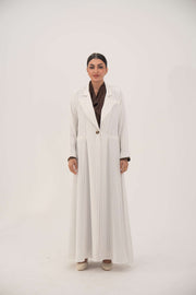 Elegant white linen abaya with soft grey pinstripes, blazer-inspired lapel, single button, and dark brown inner cuffs - Elegant abaya