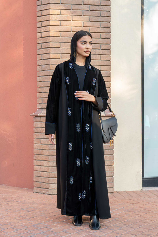 Elegant black abaya with blue embroidery made from crepe and velvet blend, perfect for formal and evening wear