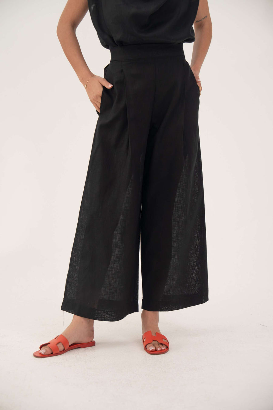 Black wide-leg linen pants with pockets, relaxed fit, lightweight and comfortable for everyday wear - Noir Linen Wide Leg Pant
