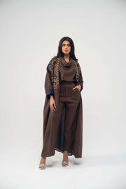 Elegant brown linen bisht abaya with navy chiffon lining and gold embroidery on upper front