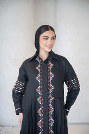 Black full-length cotton abaya with multicolor traditional-inspired embroidery on front, sleeves, shoulders, and back.