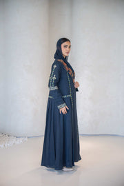 Navy blue breathable lightweight linen abaya with intricate multicolor floral hand-embroidery and a structured notched lapel collar.