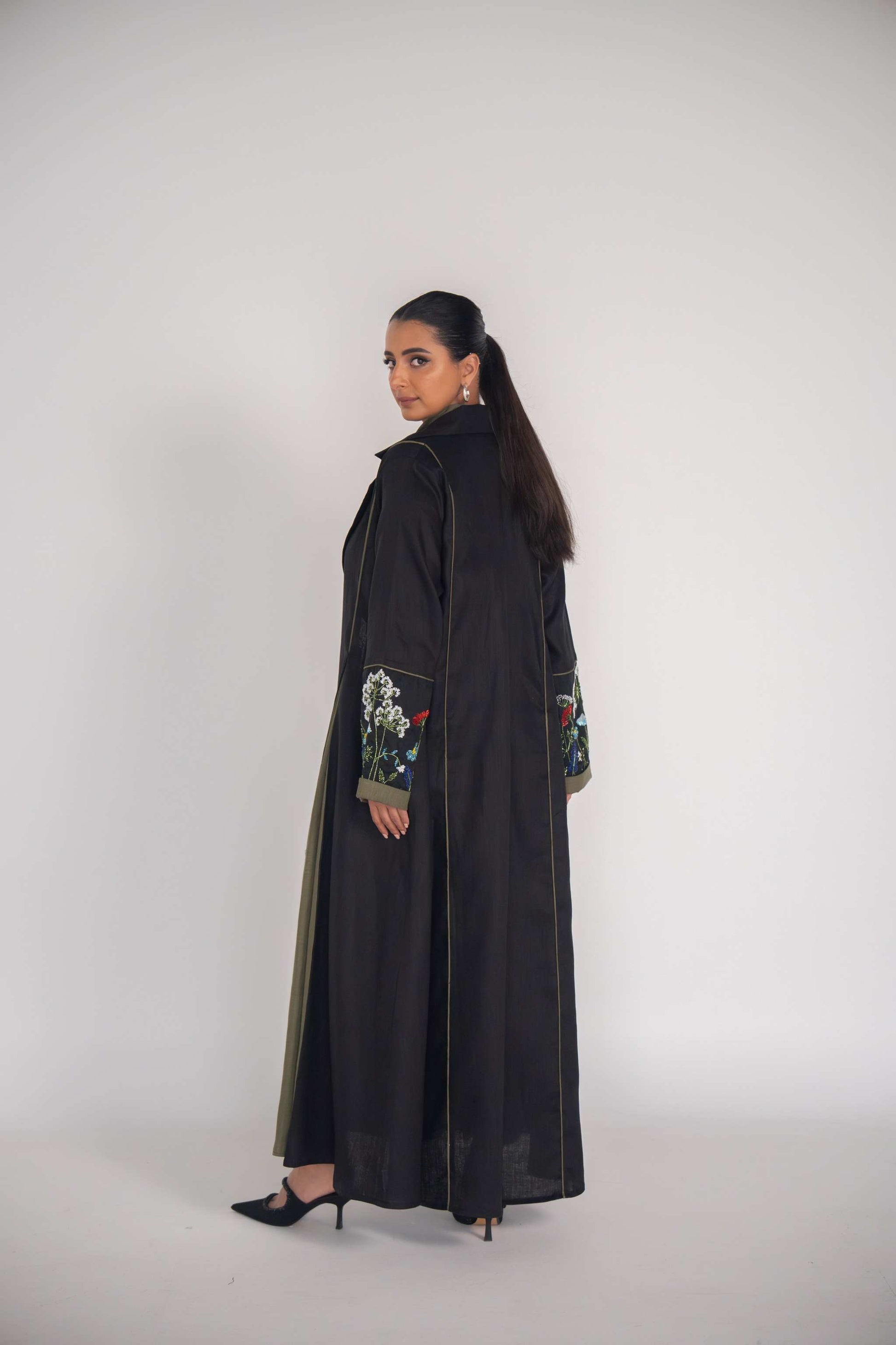 Elegant rayon abaya with embroidered sleeves and olive chiffon lining, designed for everyday and special occasions