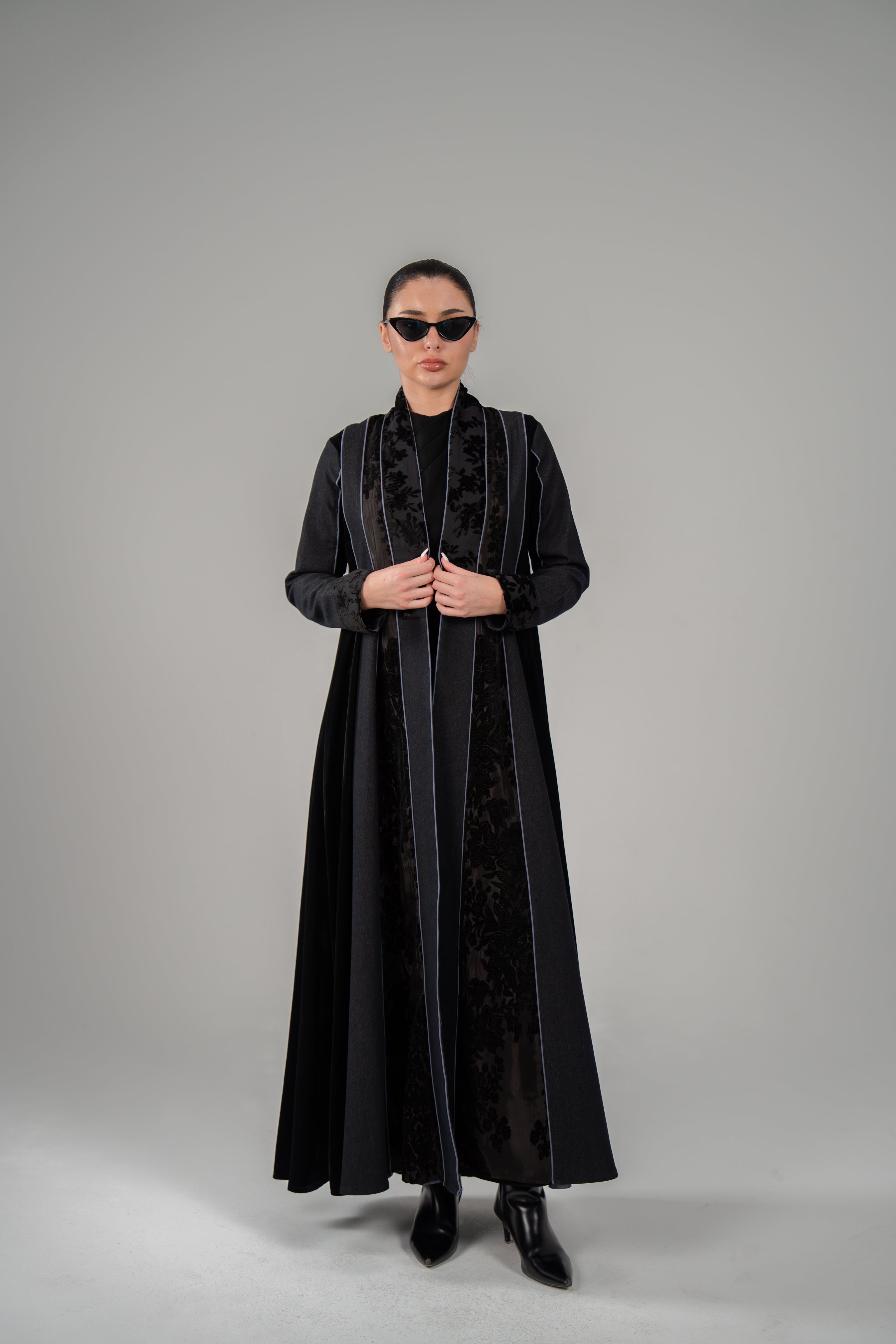 Stylish black abaya with textured velvet front panel and fine piping details layered over periwinkle chiffon inner dress