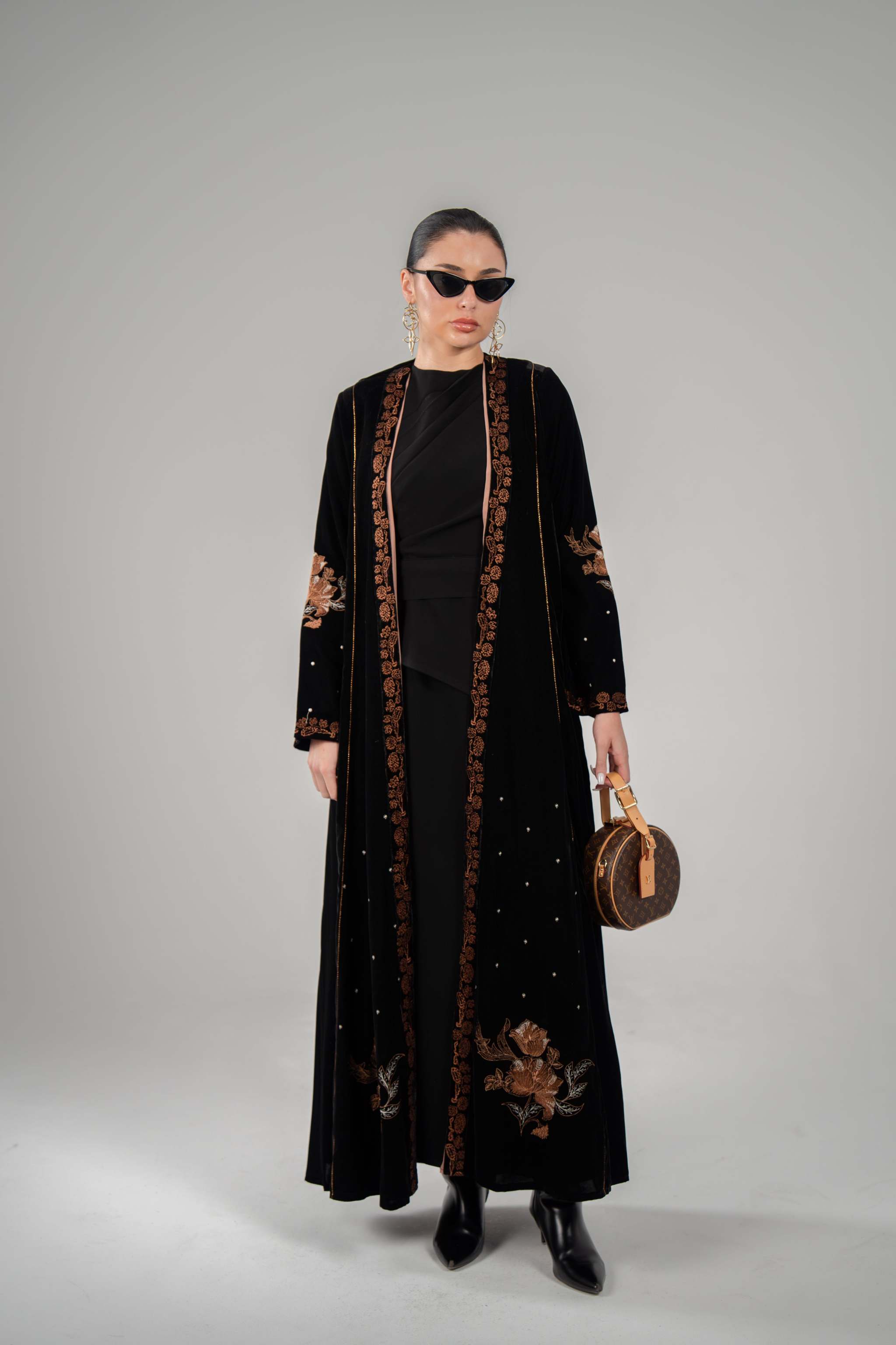 elegant abaya with black velvet outer layer and bronze machine embroidery