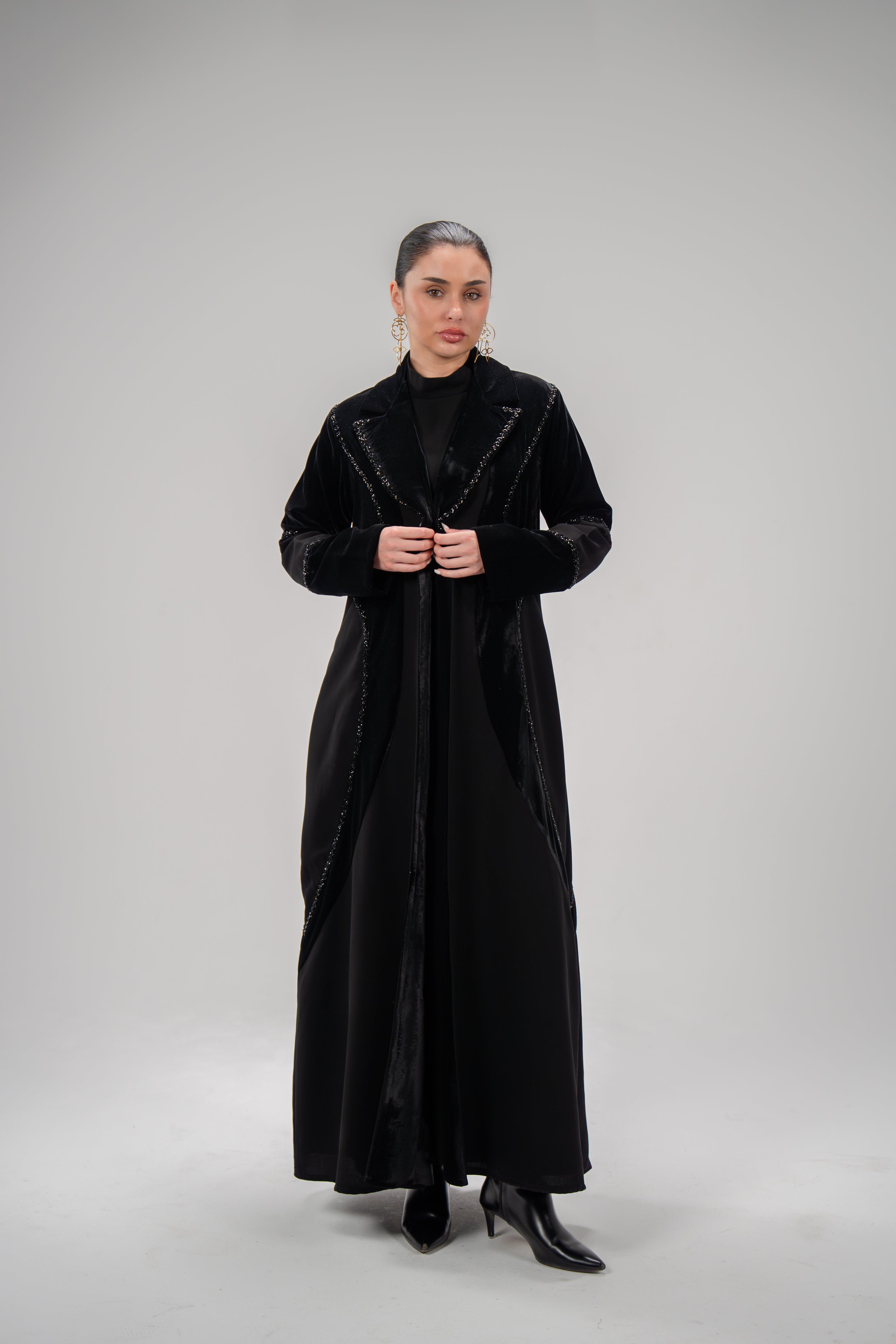 Elegant black abaya in rich velvet with hand embroidery on lapel and sleeves for special occasions