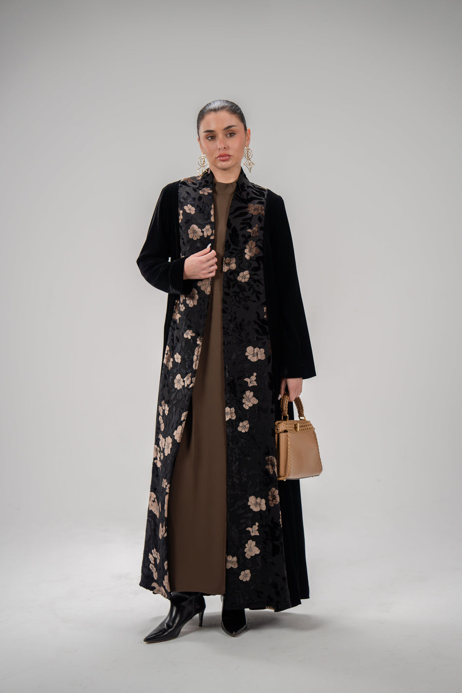 Elegant black velvet abaya with bronze floral patterned front panel on crepe for formal occasions