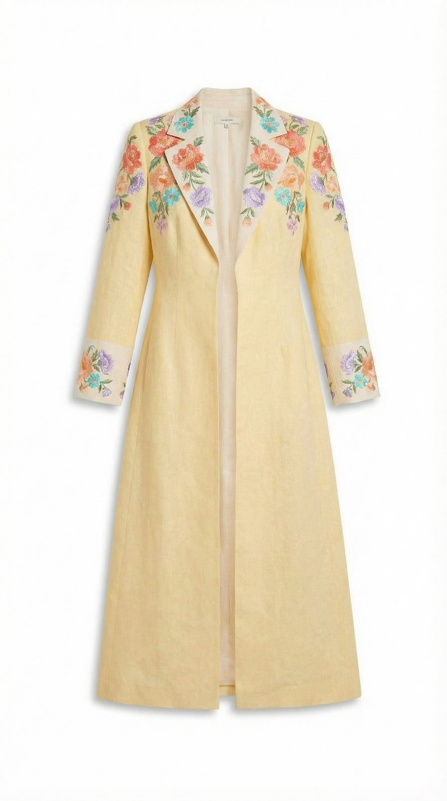 Yellow coat with floral embroidery on a white background