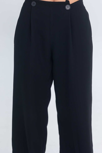 Black Inner Code pant with button details on the waistband